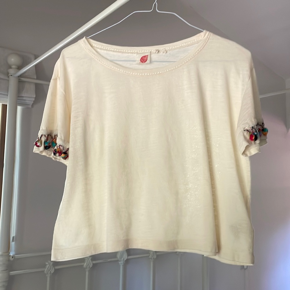 Anthropologie Lilka Cream T-Shirt with colorful Pom Poms